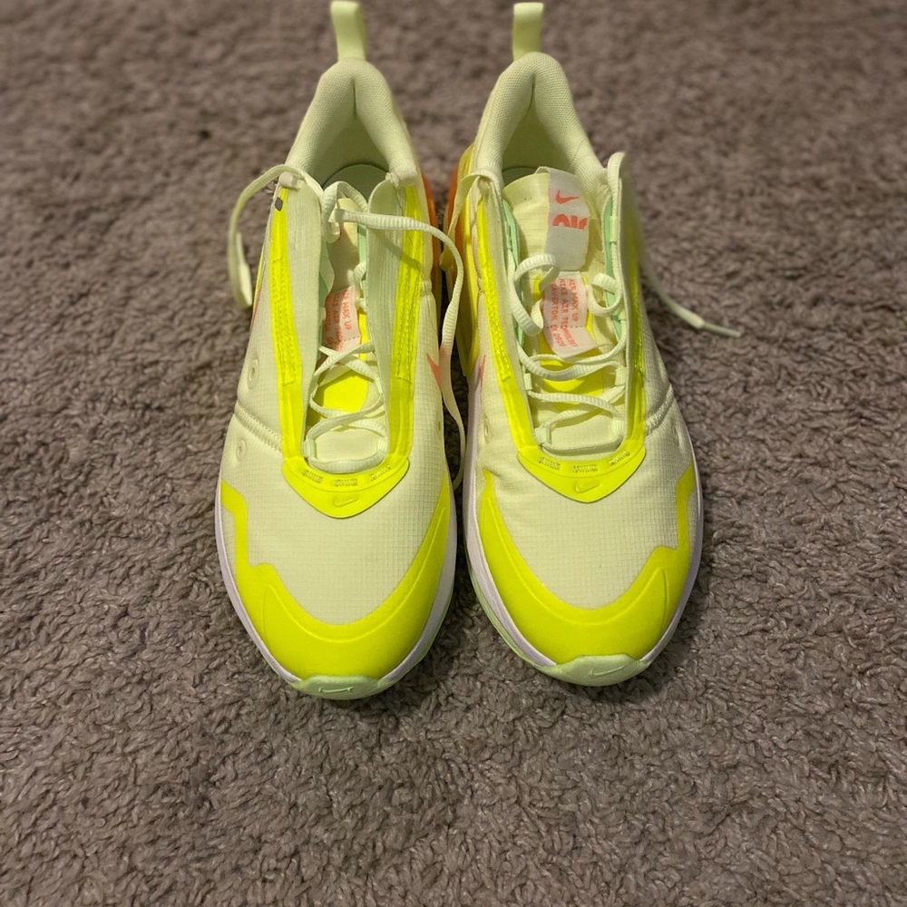 New neon green Nikes AIR MAX. super cute and a pop of color. Never worn.